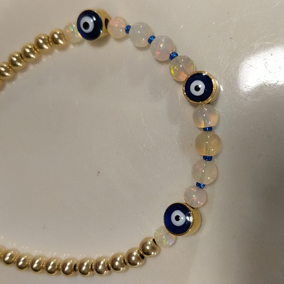 The evil protection eye 24 k gold and Ethiopian welo opal bracelet - Picture 5 of 8